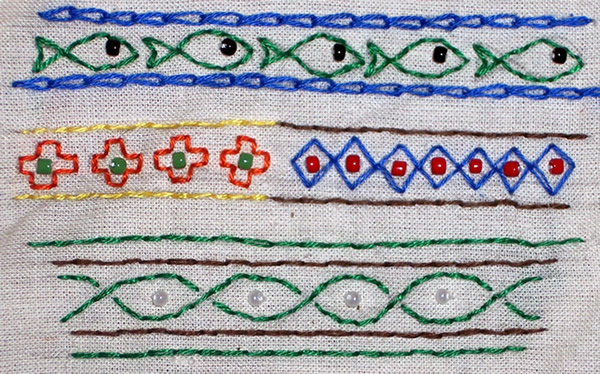 Embroidered trim samples with beads